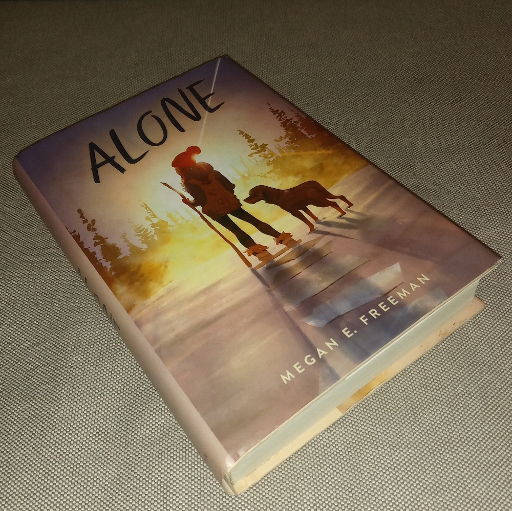 FREE WITH ANY PURCHASE❤️ALONE by Megan E. Freeman hardcover book
